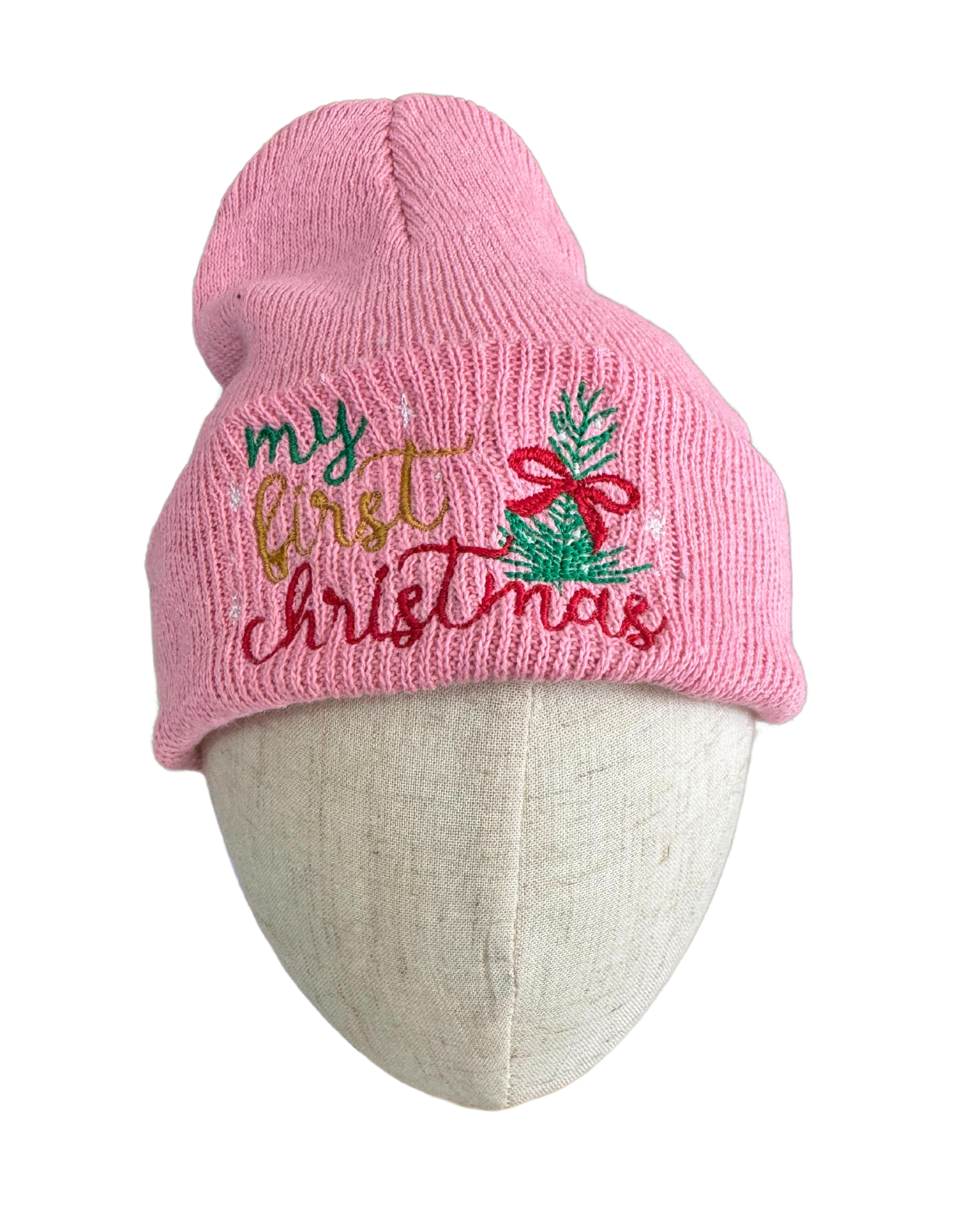 Embroidered pink baby beanie with "My First Christmas" design.