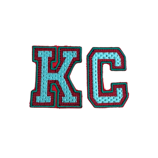 KC varsity letter iron-on patch in aqua blue and red colors, handmade and ready for shipping.