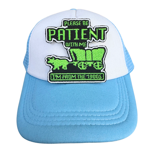 "Please Be Patient with Me, I'm from the 1900s" iron-on patch with neon green embroidery featuring a covered wagon inspired by the Oregon Trail game, handmade and ready to ship.

