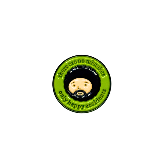 Afro Painter enamel pin on white background with quote “There are no mistakes, only happy accidents”


