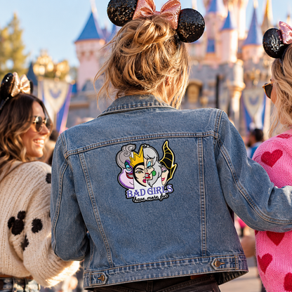 Bad Girls Have More Fun embroidered patch on the back of a denim jacket