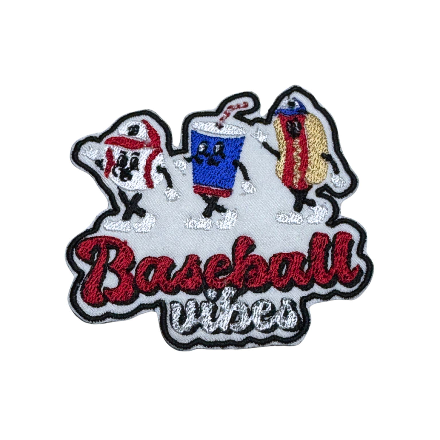 Embroidered patch featuring a smiling popcorn box, soda cup, and hot dog dancing with the words "Baseball Vibes" in red and white script.
