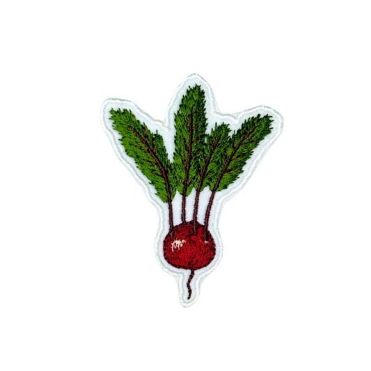 Embroidered beet iron-on patch photographed on white background, centered