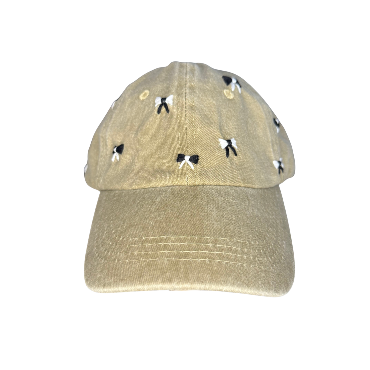 Beige cap with black and white patterns on a white background