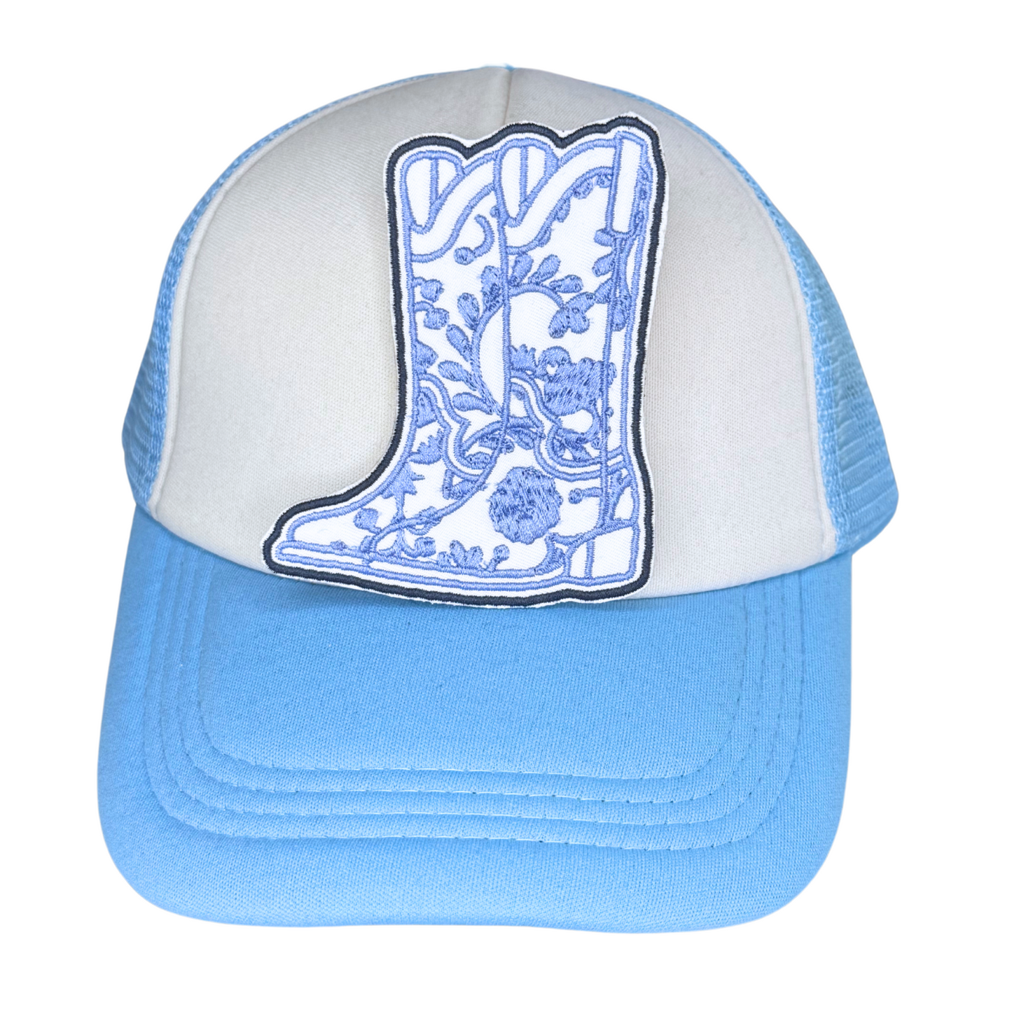 Light blue trucker hat with embroidered floral cowboy boot patch

