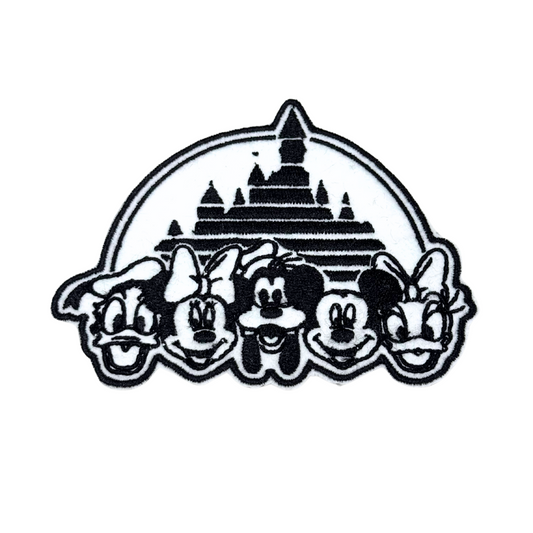 Front view of black and white embroidered castle and Disney friends patch
