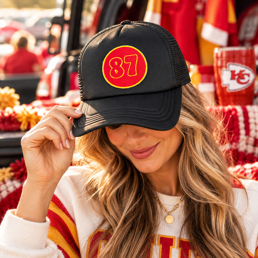 Model wearing black Kansas City 87 trucker hat