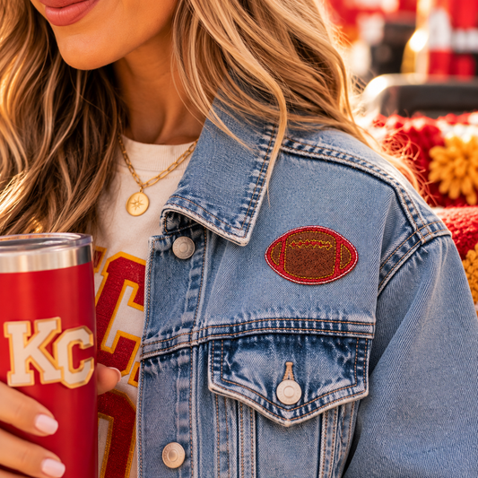 Kansas City red and gold football patch styled on a denim jacket