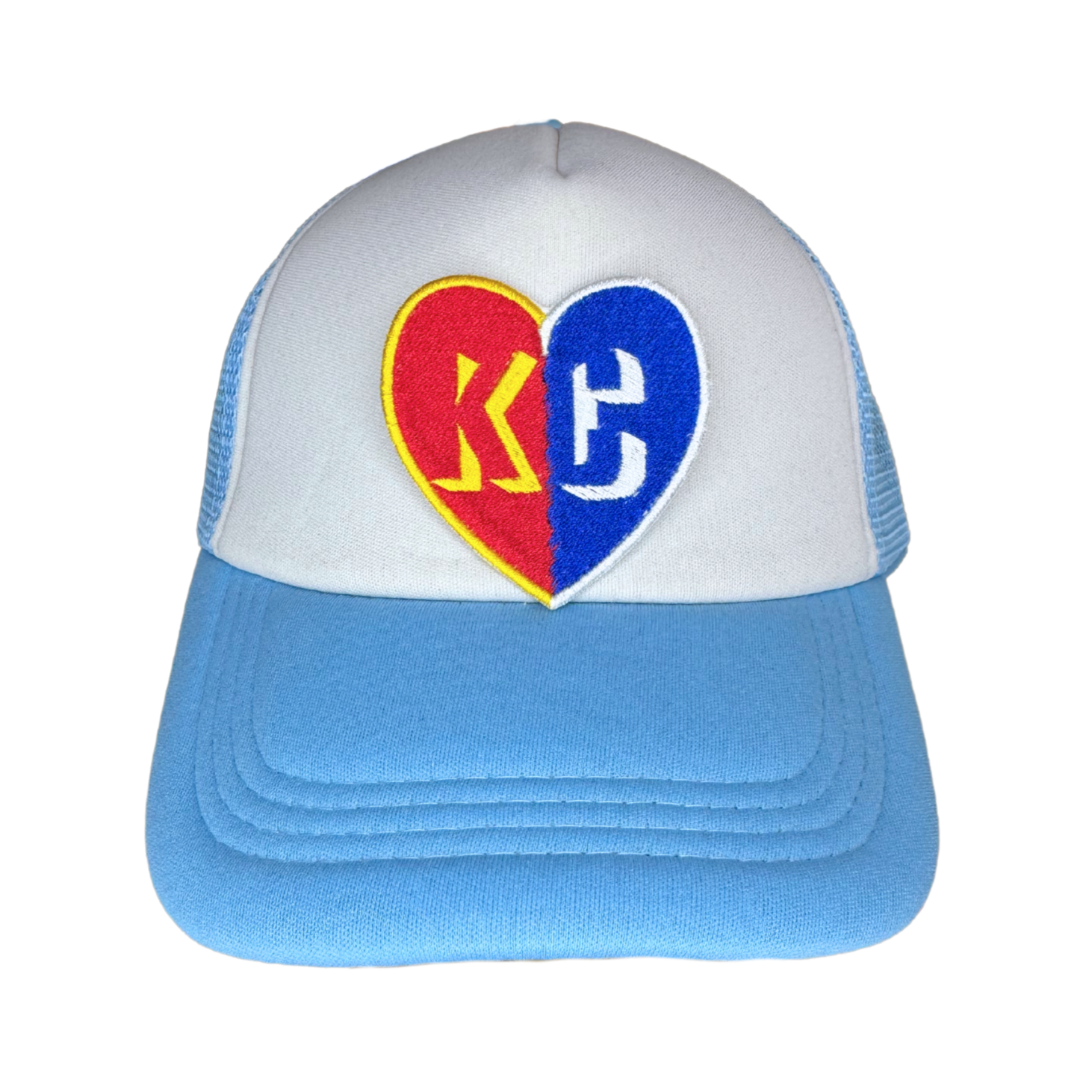 Patch ironed onto a white and blue trucker hat

