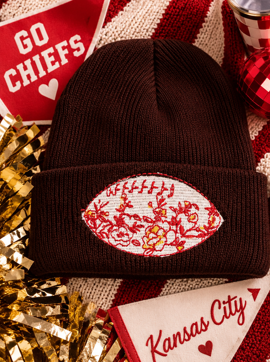 Brown embroidered football beanie with red, white and gold floral football design
