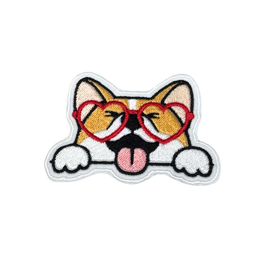 Cute corgi embroidered patch with red heart glasses and tongue out
