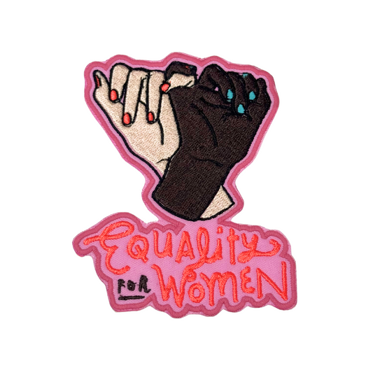 Front view of embroidered Equality for Women patch showing two hands linked in solidarity


