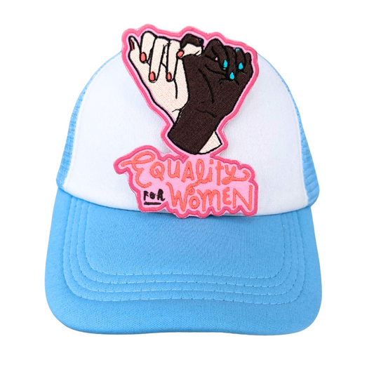 Equality for Women embroidered patch heat pressed on a blue and white trucker hat

