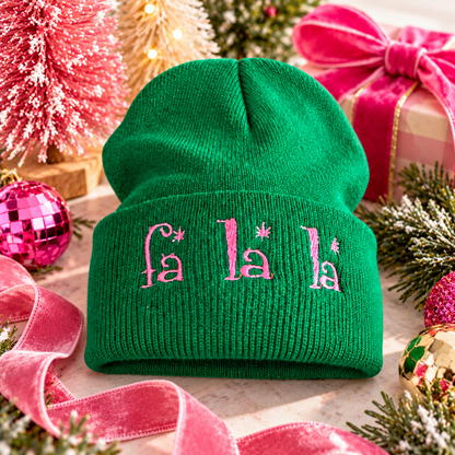 Bright green Fa La La embroidered Christmas beanie styled with pink holiday accents