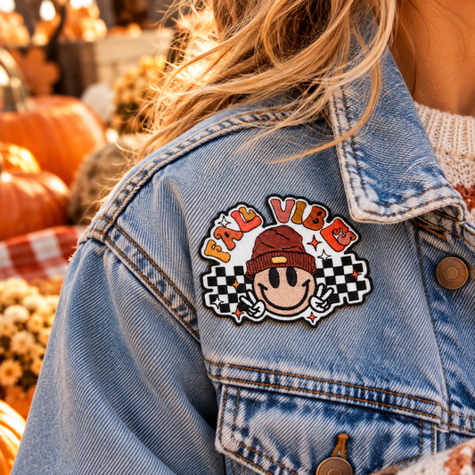 Fall Vibes smiley iron-on patch styled on denim jacket