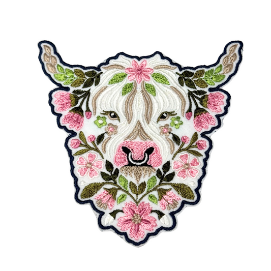 Front view of embroidered floral Highland cow iron-on patch
