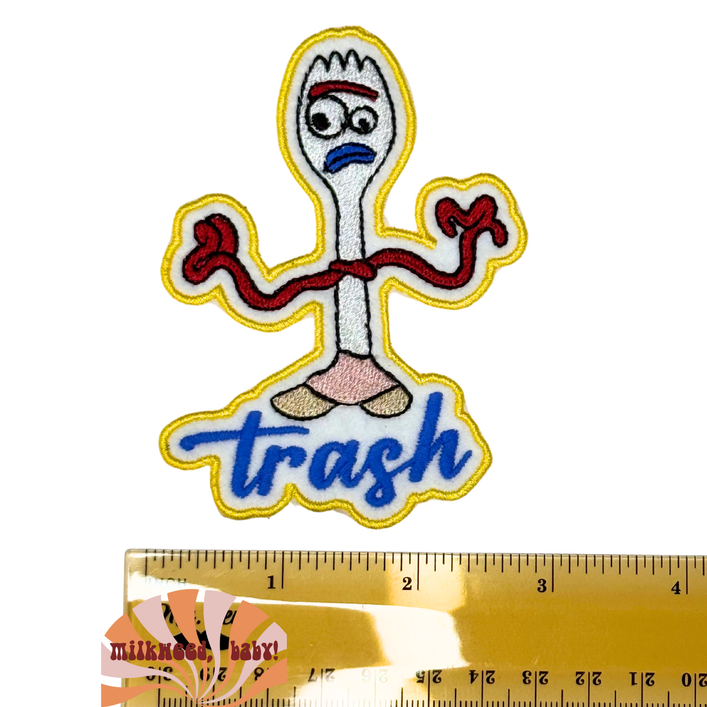 Forky patch placed next to ruler for scale reference