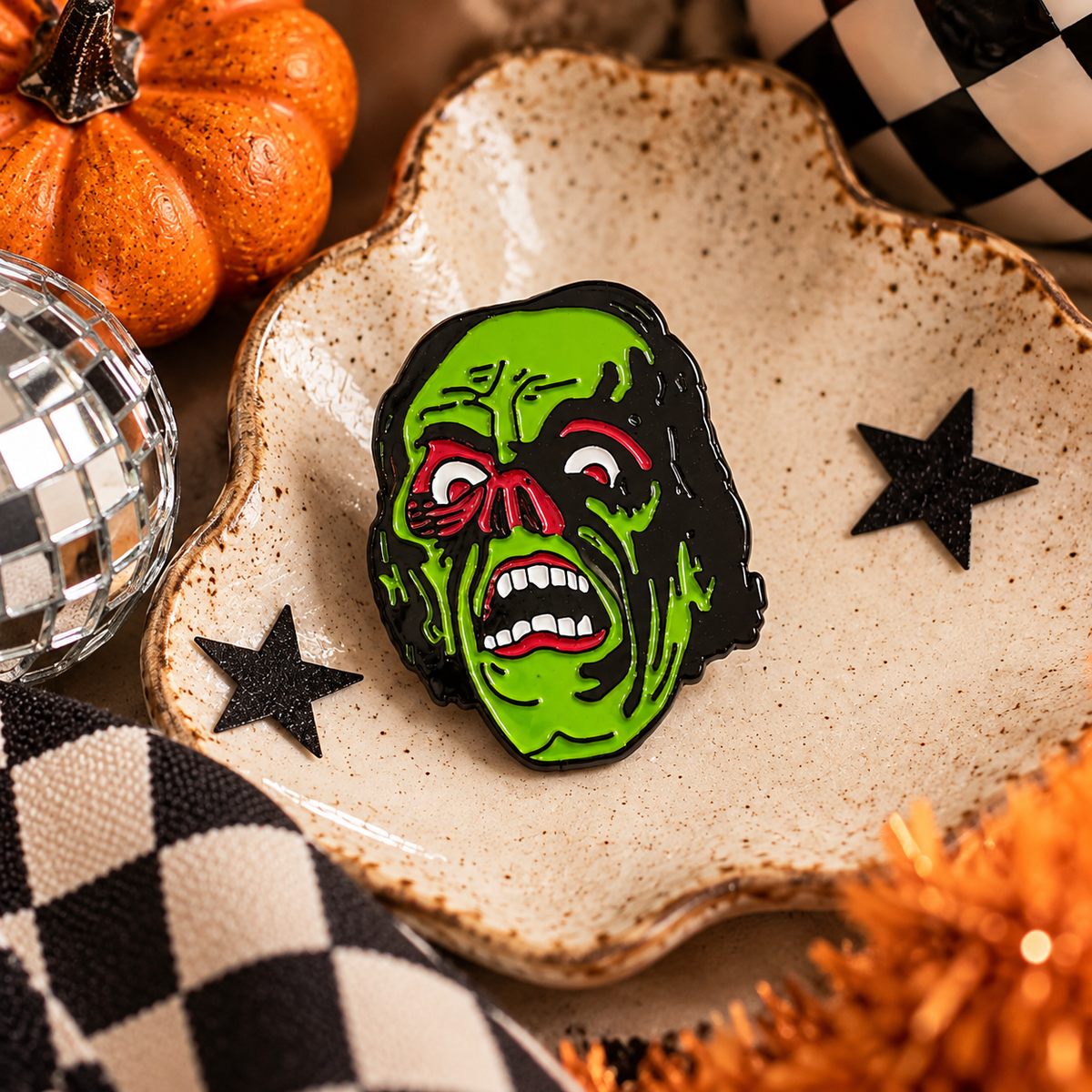 Green Frankenstein's monster retro horror enamel pin styled for Halloween
