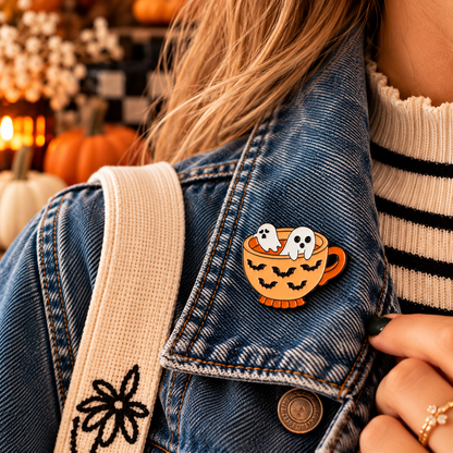 Ghosts in a teacup Halloween enamel pin on denim jacket lifestyle image