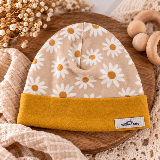 Golden daisy organic cotton baby beanie hero