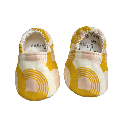 Golden Rainbow baby moccasins original front view, size 0–3 months