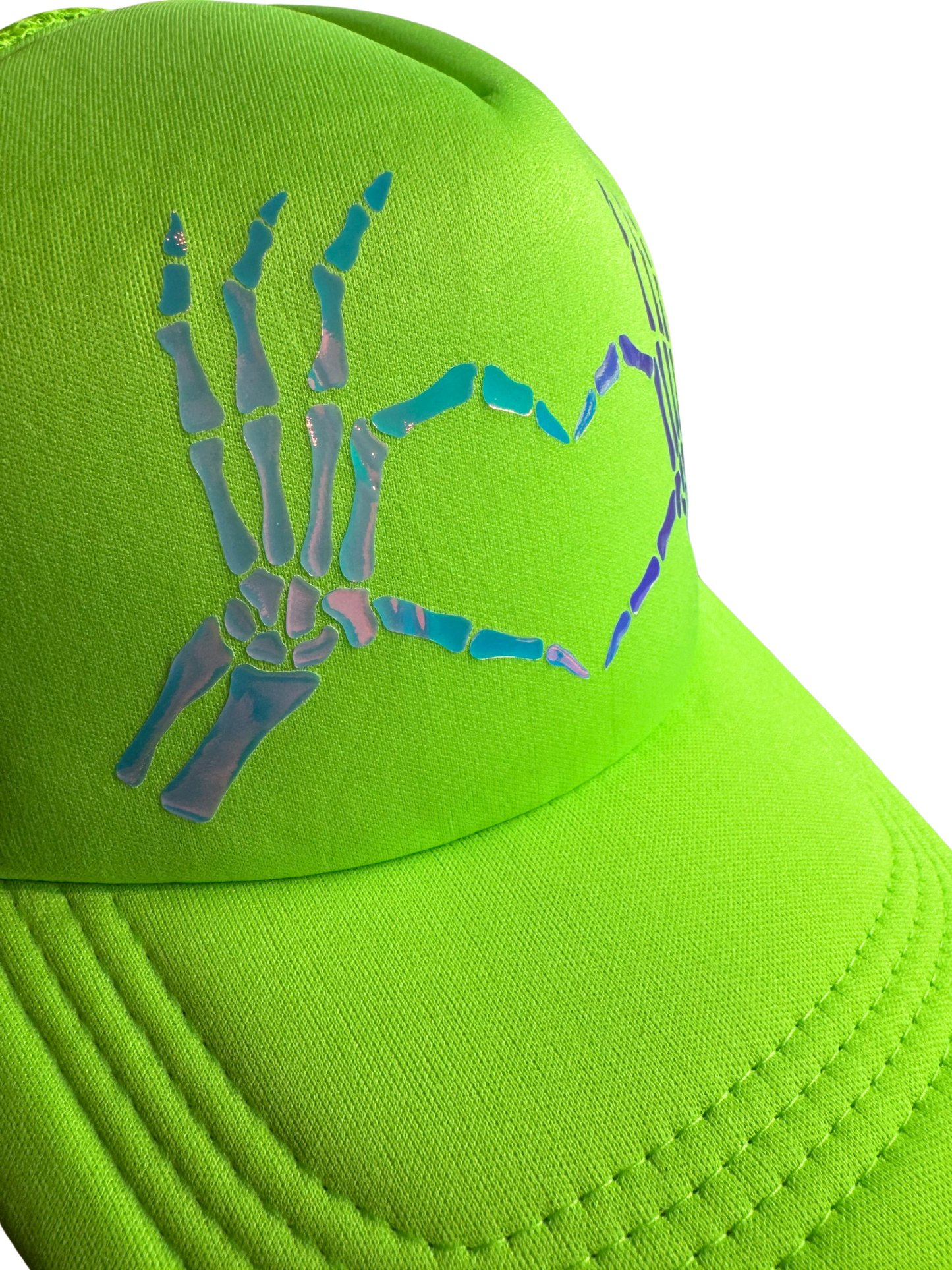 Green cap with a skeleton hand design on a white background
