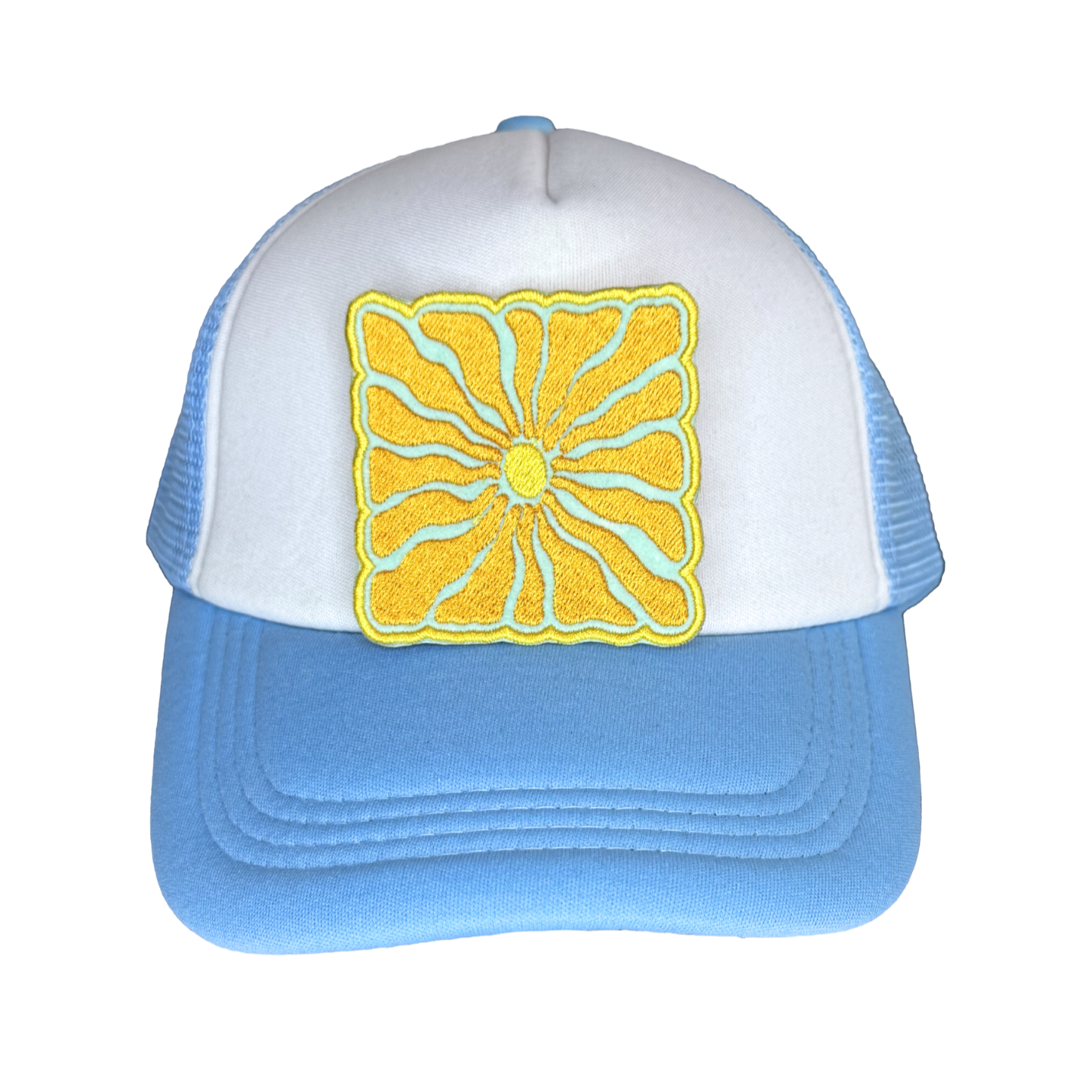 Groovy sun iron-on patch pressed on a blue and white trucker hat