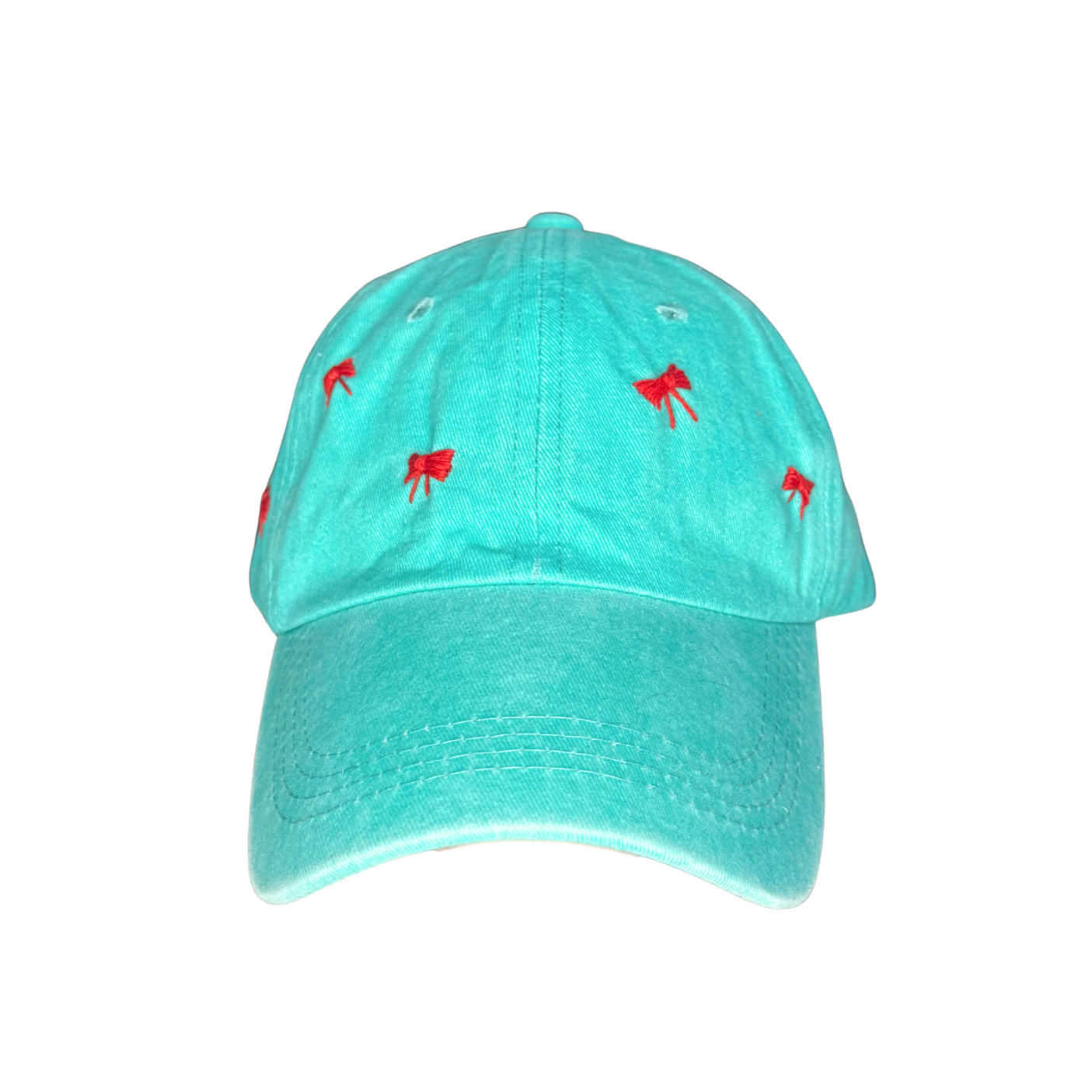 Turquoise cap with red embroidered designs on a white background