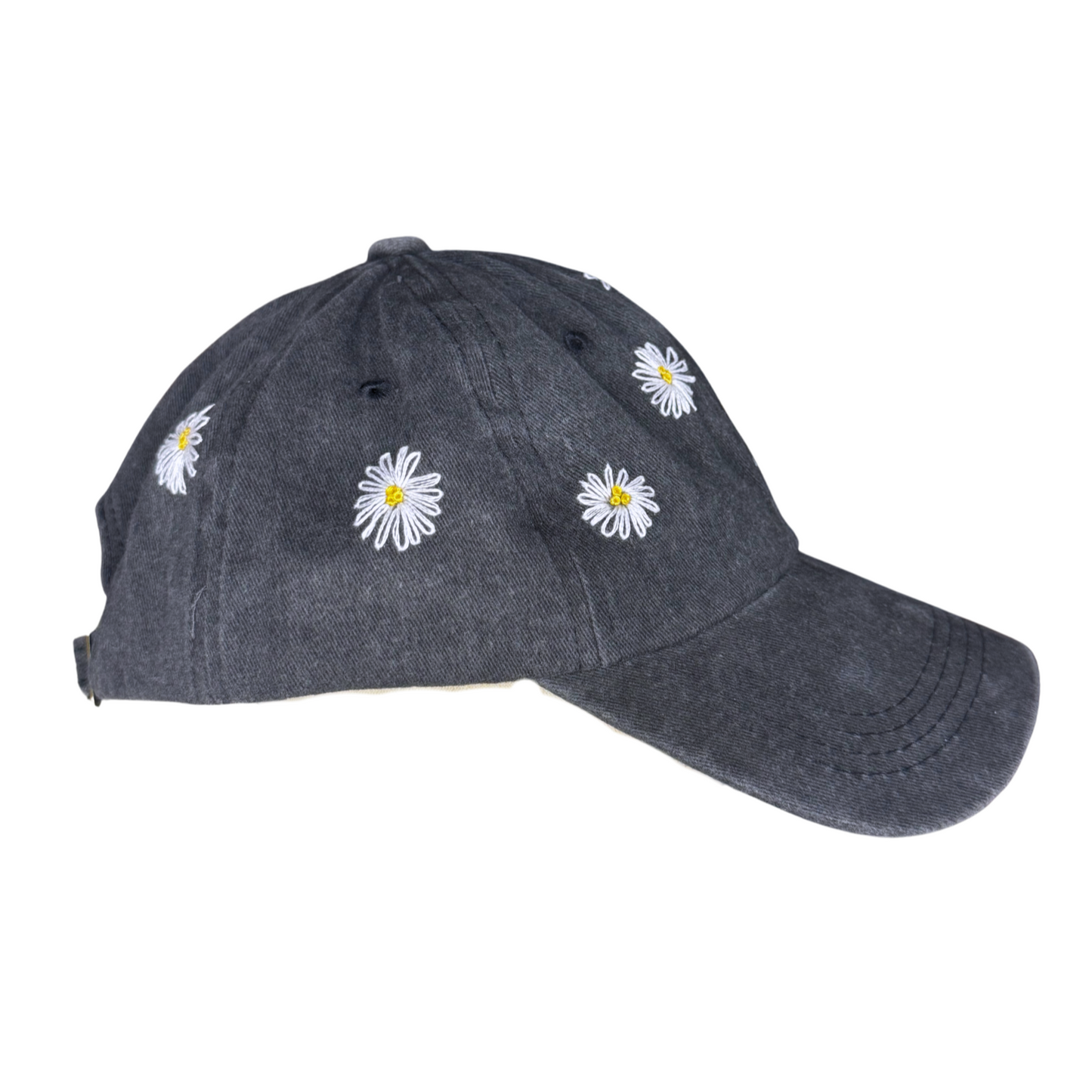 Dark denim cap with white daisy flowers on a white background