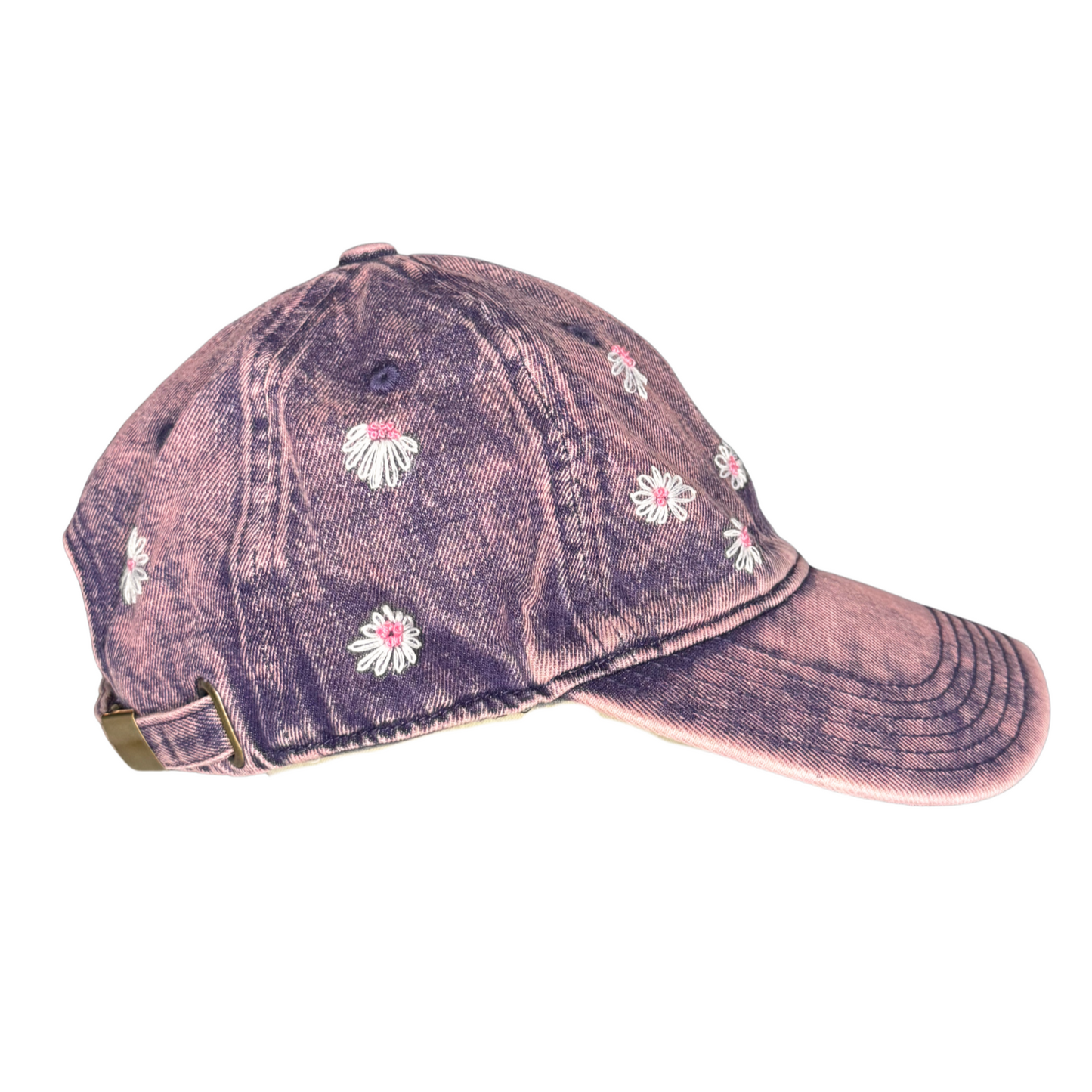 Vintage-style cap with floral embroidery on a white background
