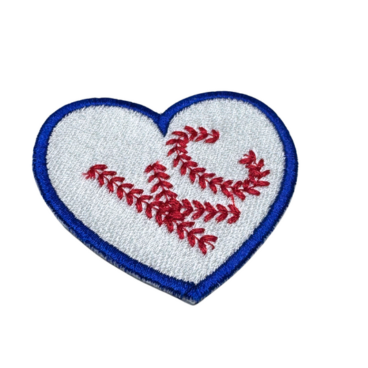 Close-up of embroidered heart KC baseball patch with stitching details