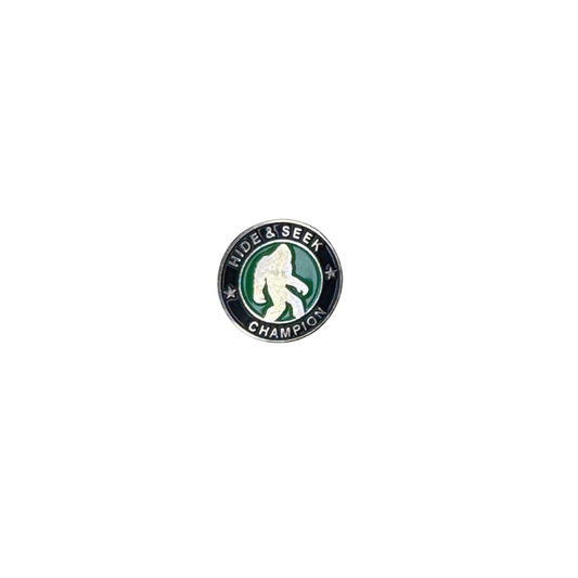 Bigfoot Hide & Seek Champion enamel pin on white background