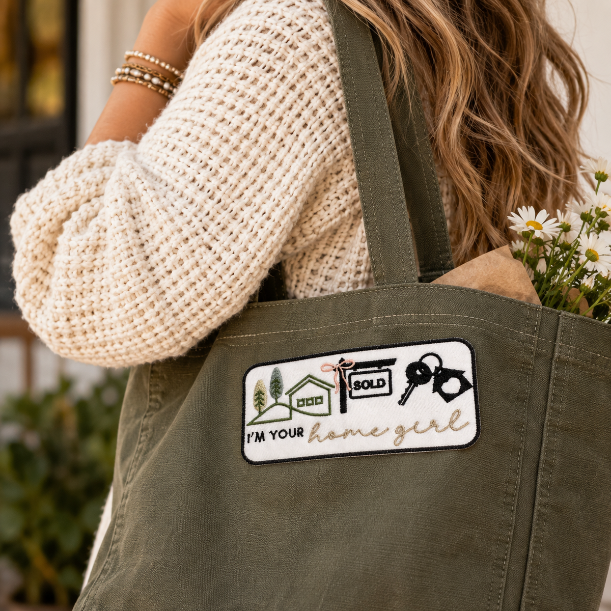 I'm Your Homegirl realtor embroidered patch styled on an olive canvas tote