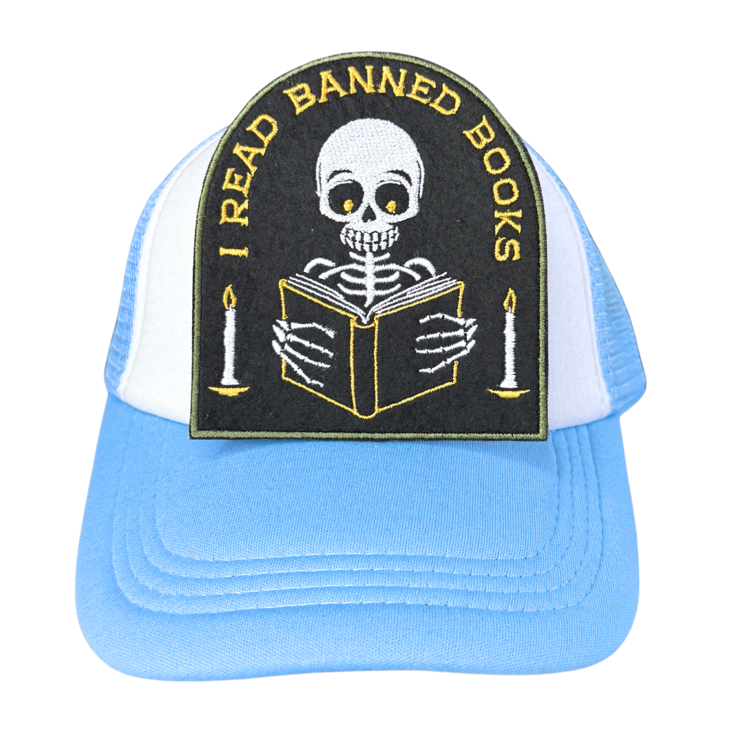 "Blue and white trucker hat with an 'I Read Banned Books' embroidered patch attached to the front."
