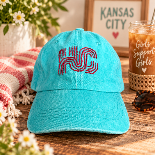 Hand-embroidered KC Current turquoise baseball hat styled product photo