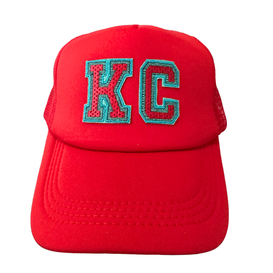 Red KC patch trucker hat with teal embroidery handmade in Kansas City
