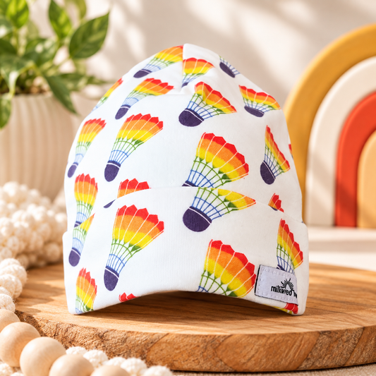 Kansas City rainbow shuttlecock organic cotton baby beanie styled hero photo