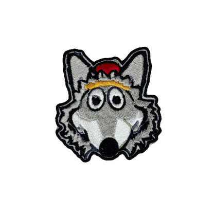 Close-up of embroidered KC Wolf iron-on patch on white background