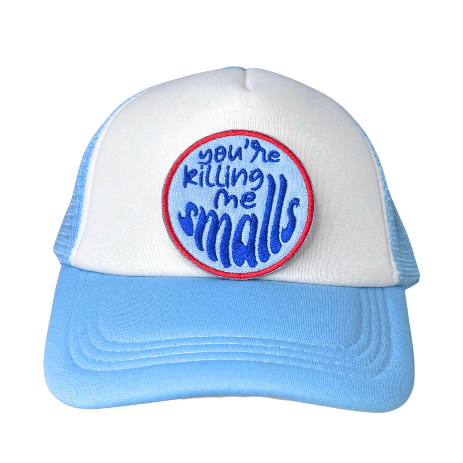 Patch ironed on to a blue and white trucker hat