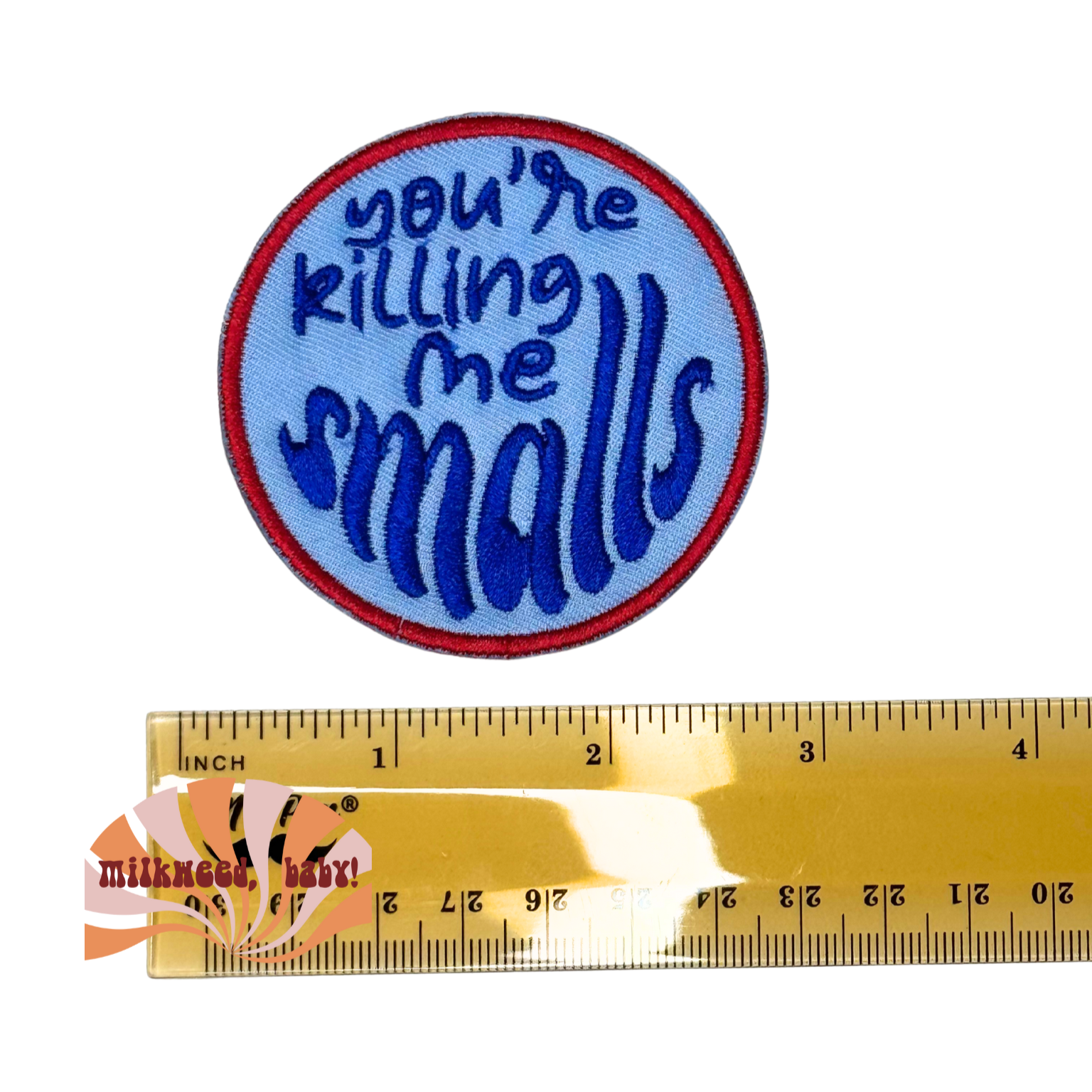 Patch shown next to ruler for scale