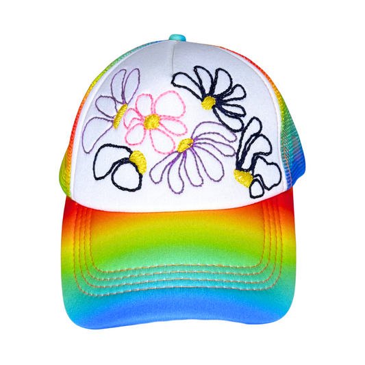 Colorful cap with floral designs on a white background