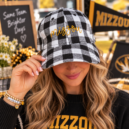 Model wearing Mizzou plaid hand-embroidered hat