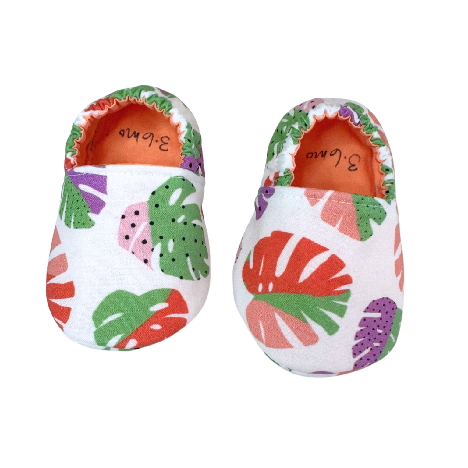 Handmade monstera baby shoes, front view, 3–6 months

