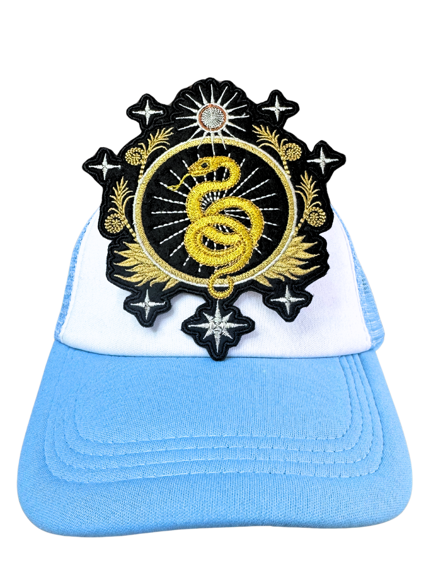 An embroidered patch featuring a gold snake coiled within a celestial black and gold design, symbolizing protection, wisdom, and rebirth.

