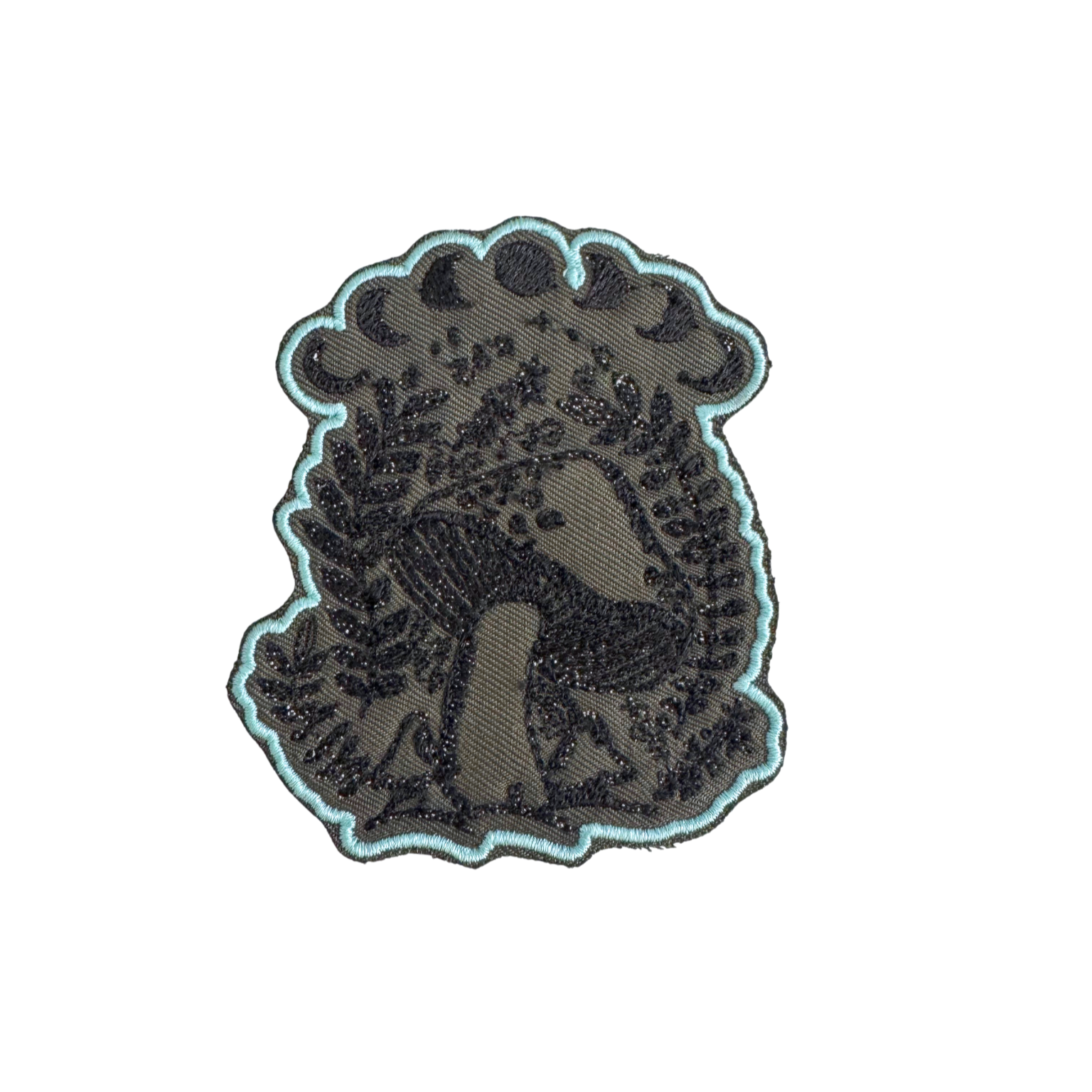Handmade mystical mushroom embroidered patch with moon phases in black and teal tones.
