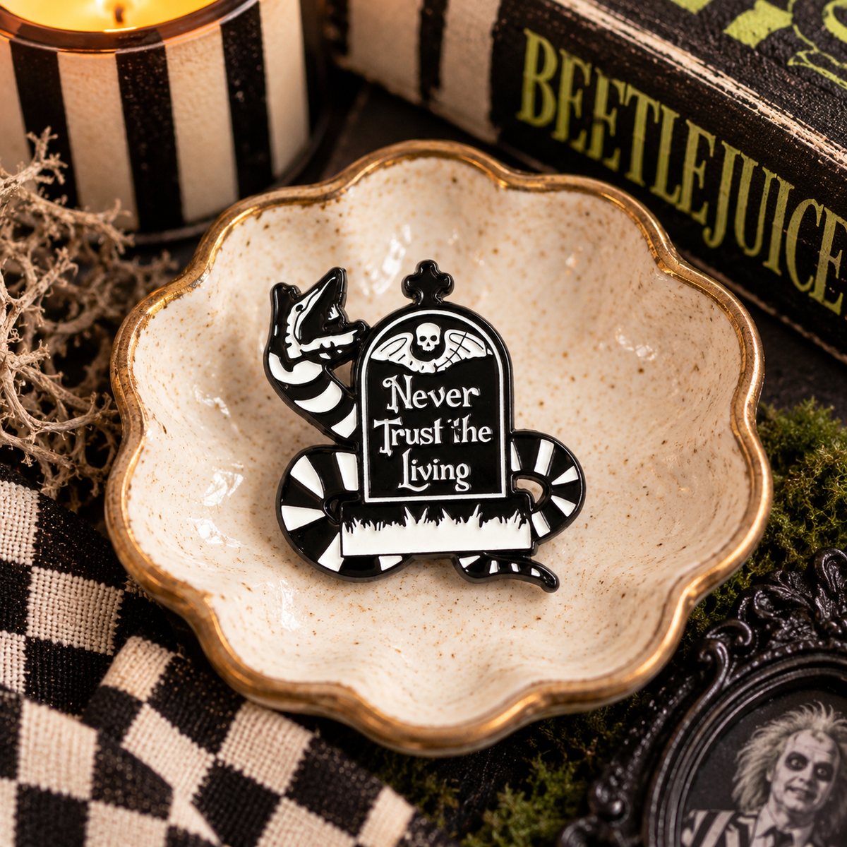 Never Trust the Living striped sandworm enamel pin hero image
