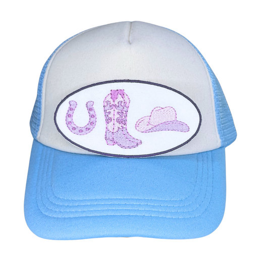 Pastel western patch ironed on blue and white trucker hat

