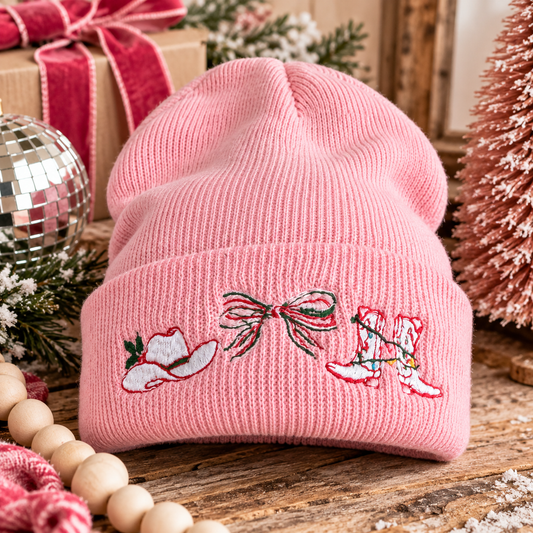 Pink Cowboy Christmas embroidered beanie styled with festive Western holiday accents.