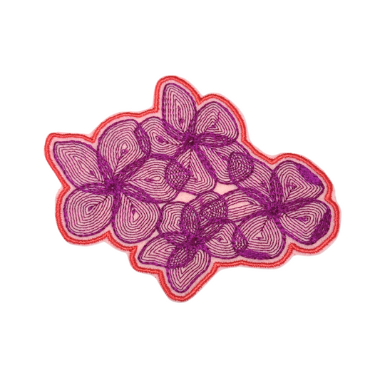 Front view of pink and purple floral embroidered iron-on patch with coral border
