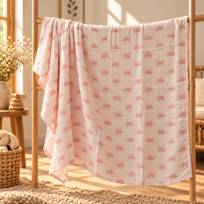 Blush rainbow cotton gauze baby swaddle showing full size and drape